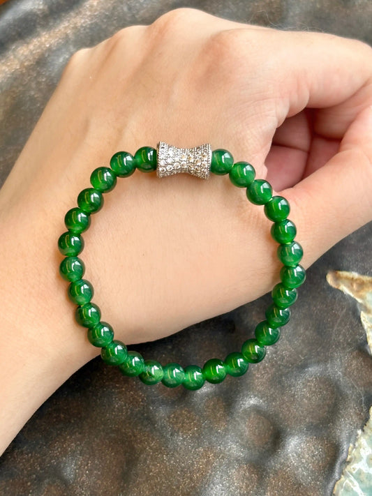 Exceptional Rich Emerald Hue Jadeite Beaded Bracelet with Pavé‑set Crystal Bow Spacer